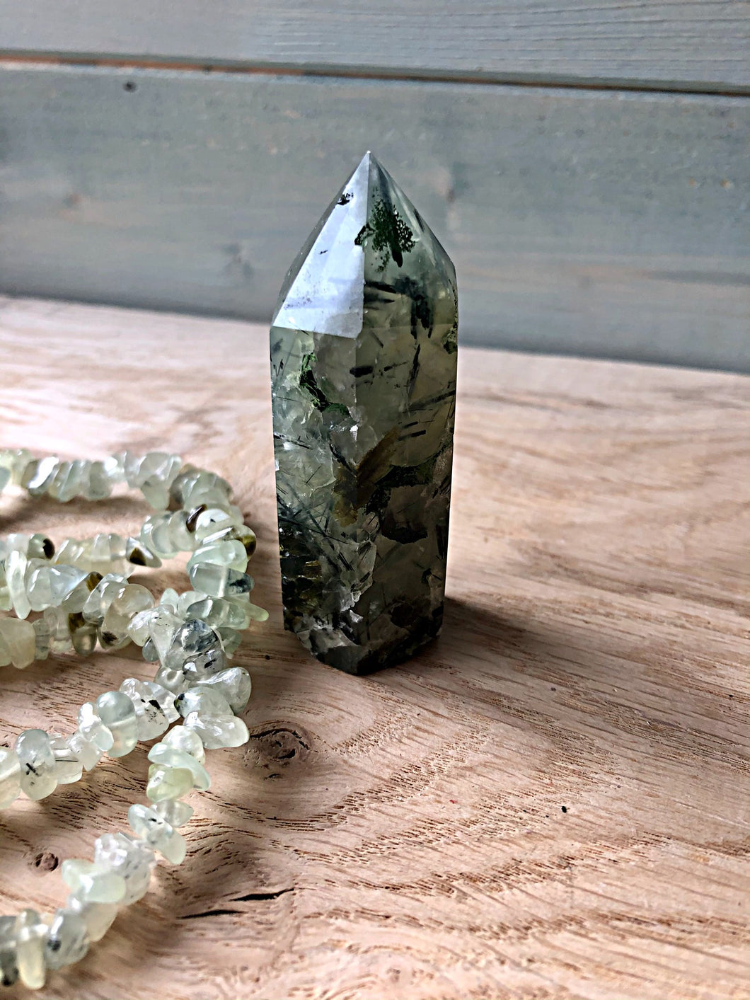 Prehnite Polished Point 6cm (with inclusions)